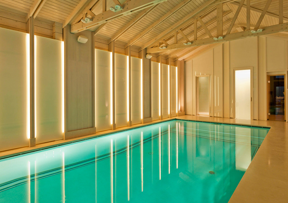 Photo of a contemporary indoor rectangular pool in Moscow.