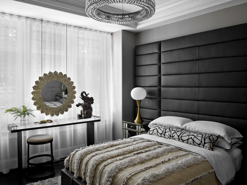 Contemporary bedroom in Chicago with grey walls, dark hardwood floors and black floor.