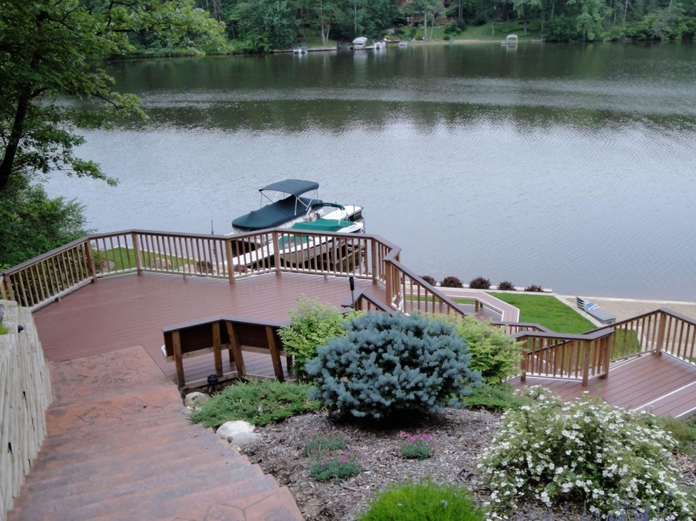 Deck - large rustic backyard balcony deck idea in Detroit with no cover