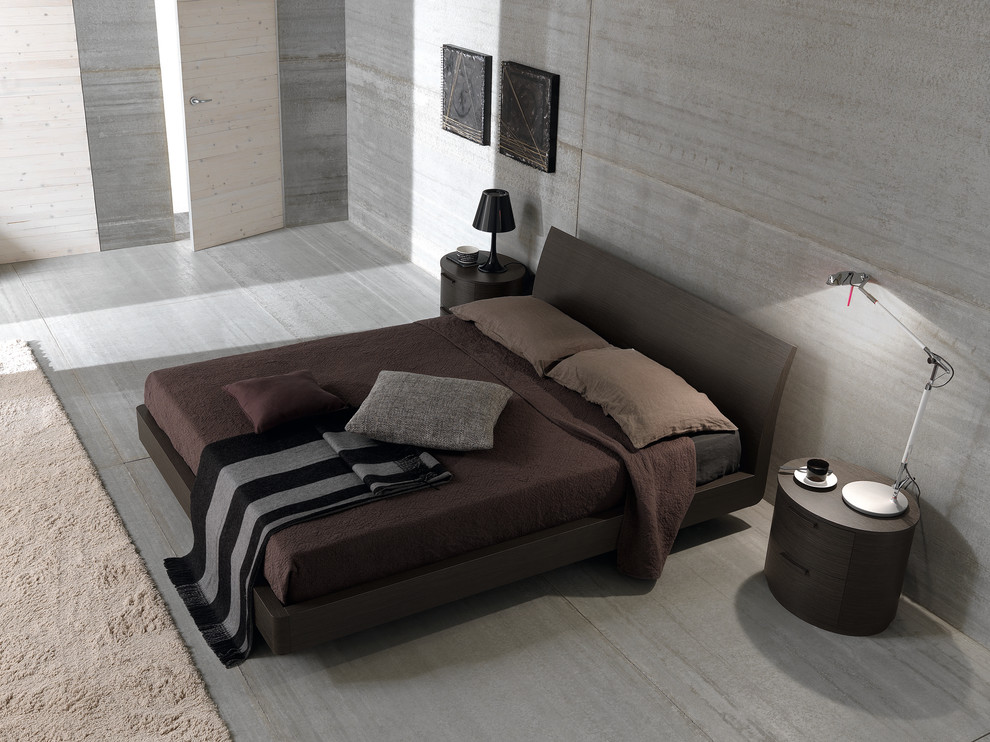 This is an example of a contemporary bedroom in Other with grey walls.