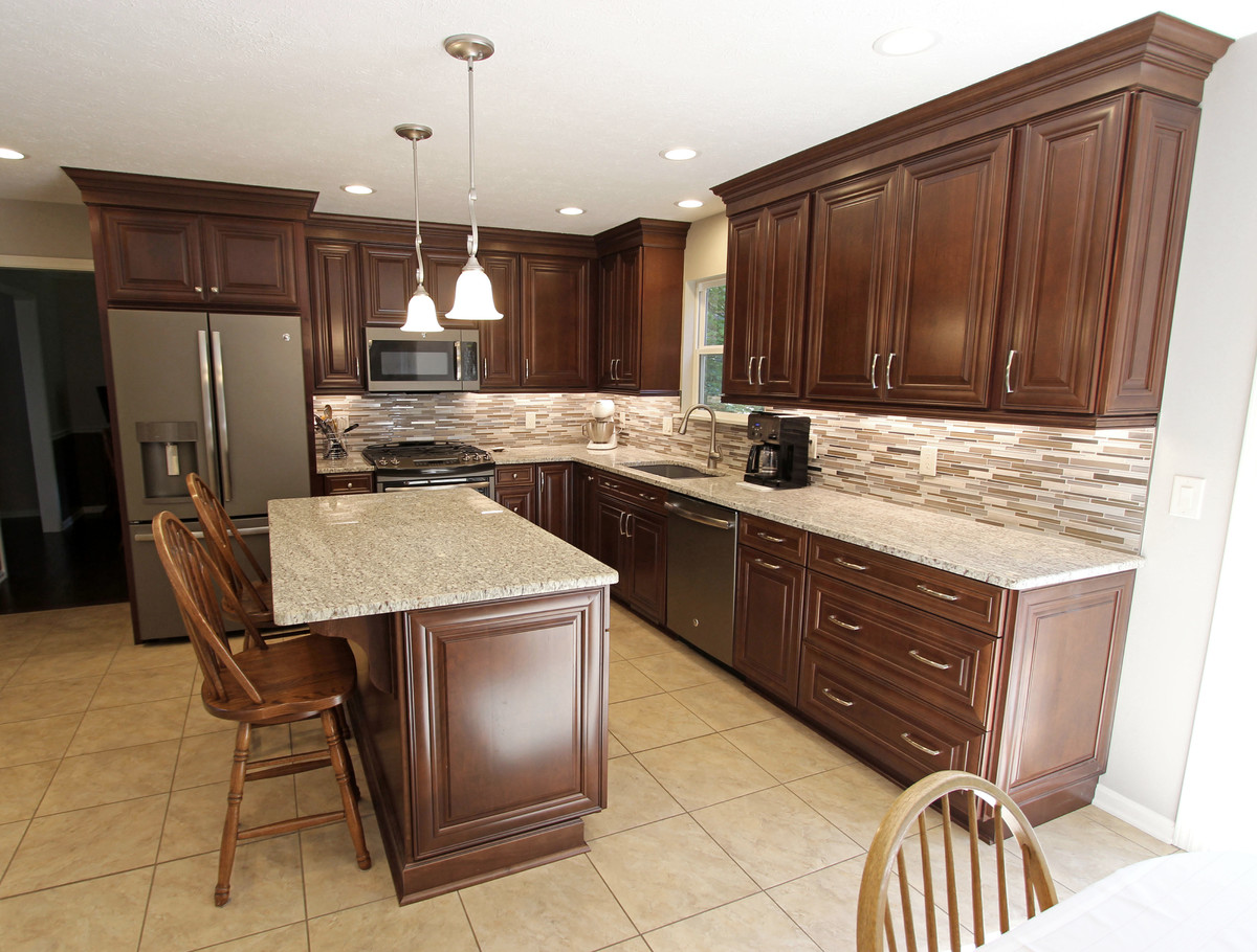 Waypoint Cherry Chocolate Cabinets And Giallo Ornamental Granite