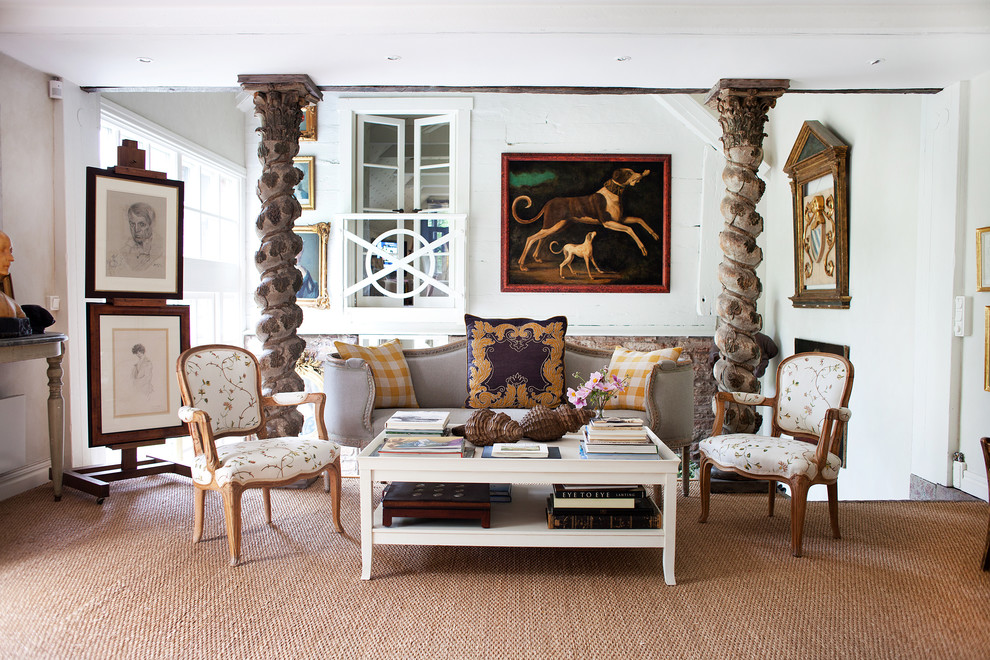 This is an example of an eclectic living room in Miami with white walls.