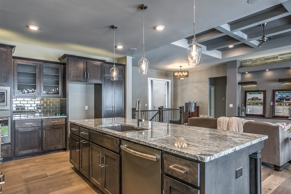 Example of a transitional home design design in Omaha