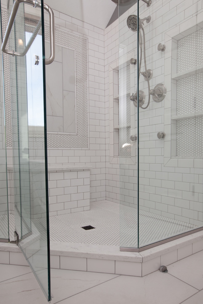 Design ideas for a mid-sized transitional master bathroom in Indianapolis with a freestanding tub, a corner shower, white tile, grey walls, ceramic floors, white floor and a hinged shower door.