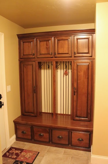 Inspiration for a mid-sized modern ceramic tile mudroom remodel with beige walls