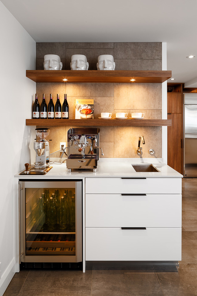 Inspiration for a contemporary eat-in kitchen in Ottawa with an undermount sink, flat-panel cabinets, white cabinets, quartz benchtops, black splashback, subway tile splashback and stainless steel appliances.