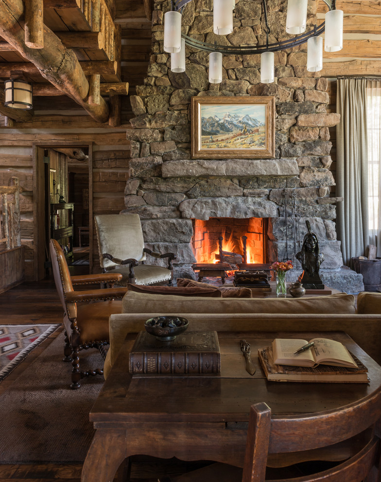 Inspiration for a country living room in Philadelphia with a standard fireplace and a stone fireplace surround.