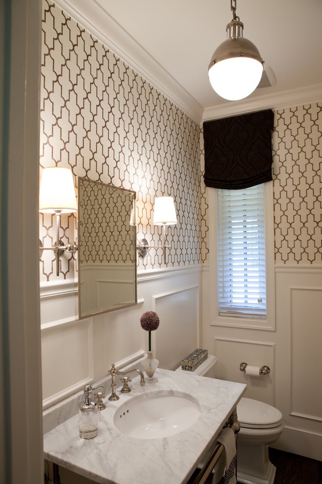 Design ideas for a traditional powder room in Baltimore with marble benchtops and white benchtops.