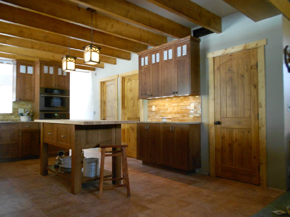 Kitchen - rustic kitchen idea in Boise