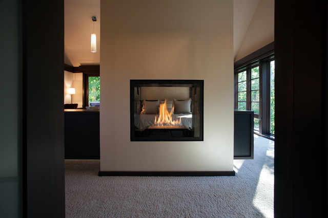 Double Sided Fireplace In Master Suite Modern Bedroom