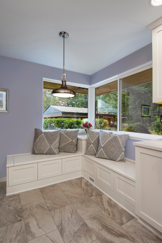 Transitional porcelain tile and multicolored floor eat-in kitchen photo in Seattle with an undermount sink, shaker cabinets, white cabinets, quartz countertops, multicolored backsplash, glass tile backsplash, no island and white countertops