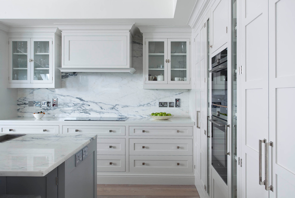 Example of a transitional kitchen design in Dublin