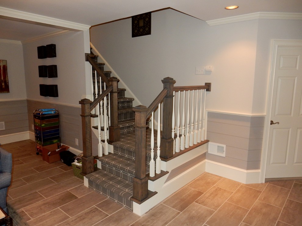 Design ideas for a mid-sized traditional basement in Atlanta with ceramic floors, no fireplace and grey walls.