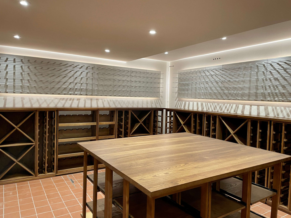 Example of a mid-sized classic wine cellar design in Essex