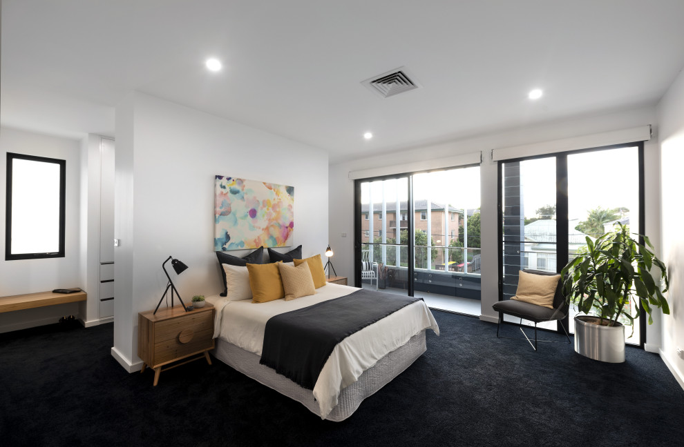 This is an example of a contemporary bedroom in Newcastle - Maitland.