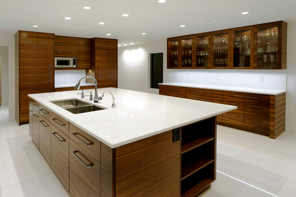 Photo of a contemporary kitchen in DC Metro with a double-bowl sink, marble benchtops, white splashback, ceramic floors and with island.