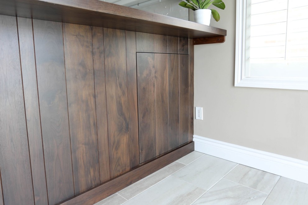 Mid-sized transitional u-shaped porcelain tile and gray floor open concept kitchen photo with a double-bowl sink, shaker cabinets, white cabinets, quartz countertops, white backsplash, ceramic backsplash, stainless steel appliances, a peninsula and white countertops