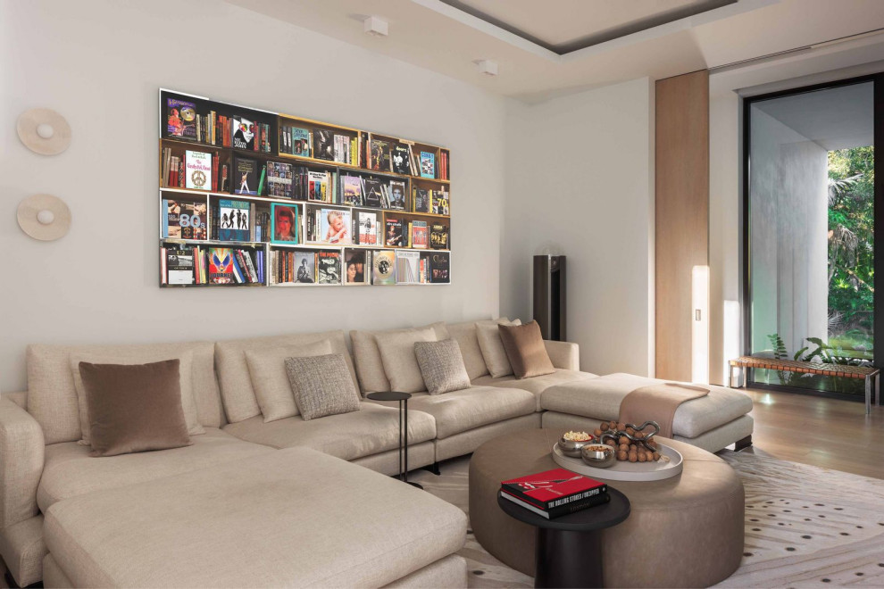 Example of a minimalist family room design in Miami