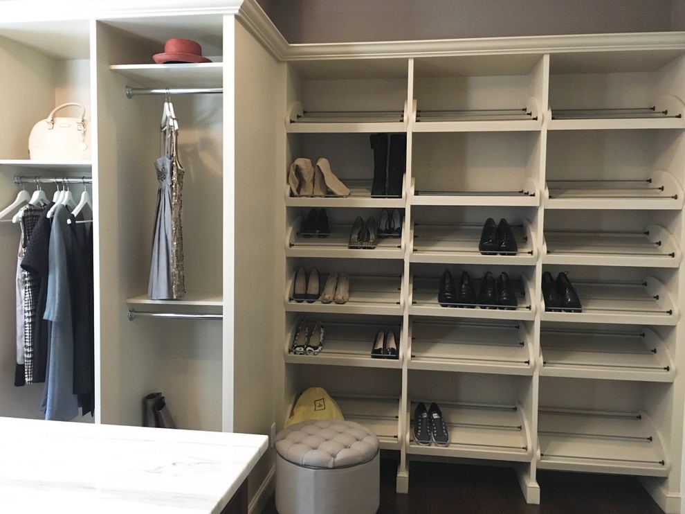 This is an example of a transitional storage and wardrobe in Boston.