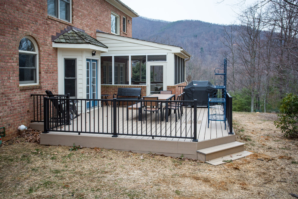 Deck - mid-sized transitional backyard deck idea with no cover
