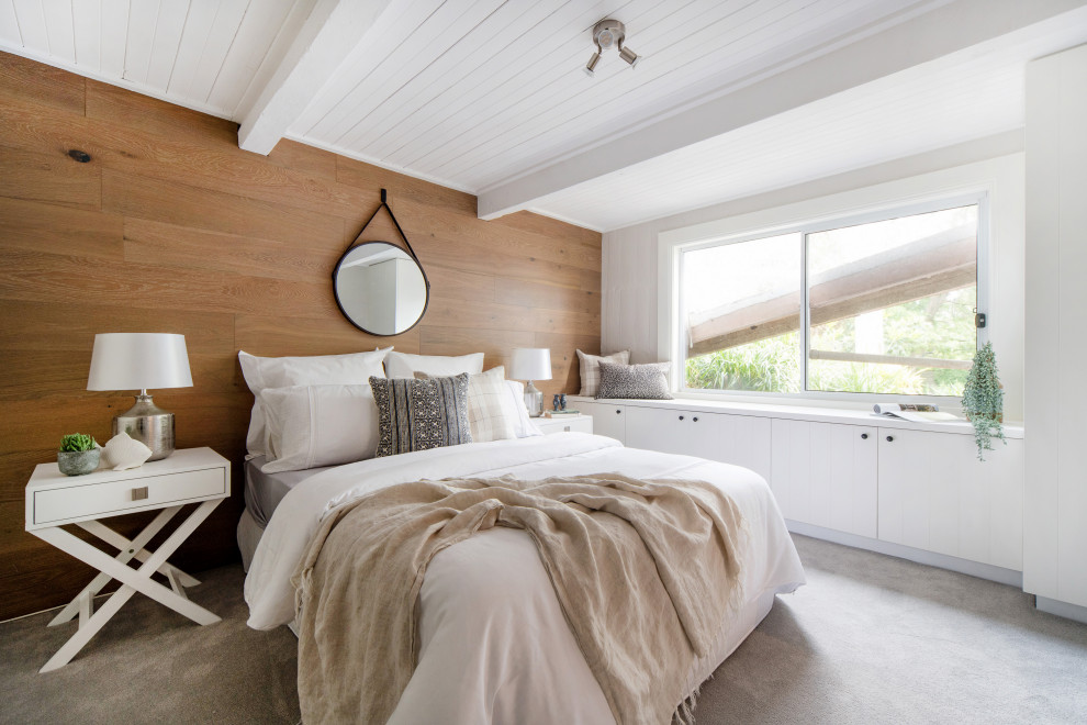 Design ideas for a transitional bedroom in Other with brown walls, carpet, grey floor and wood walls.