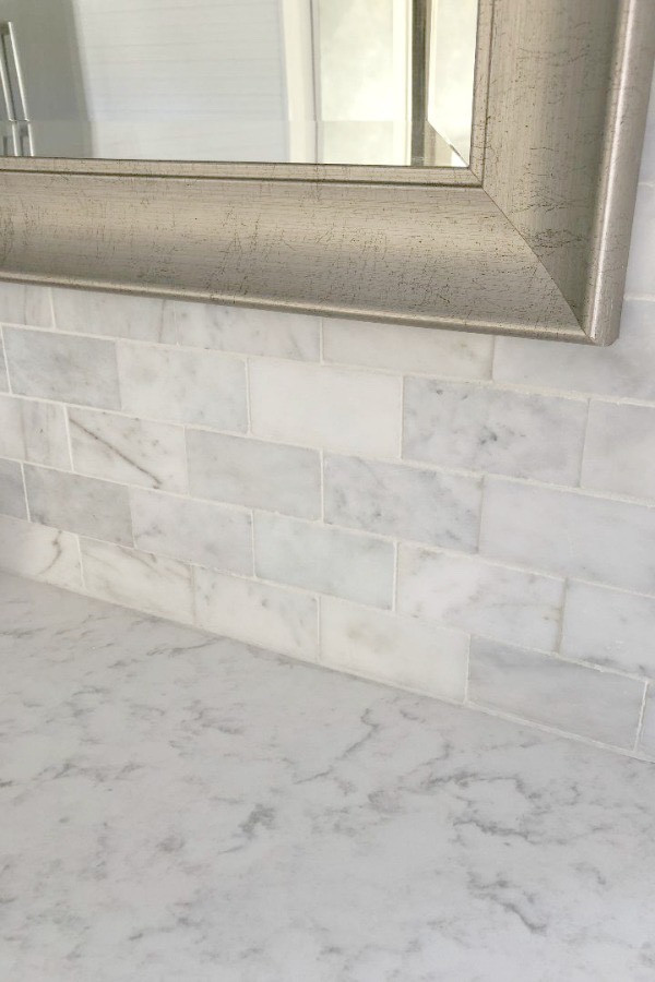 Can you use carrera marble as a backsplash in a farmhouse kitchen?