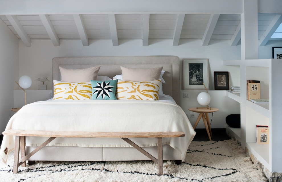 Design ideas for a beach style guest bedroom in Other with white walls and no fireplace.