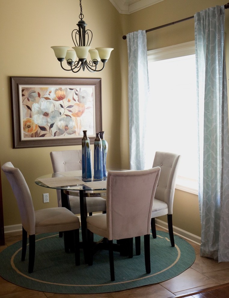 Example of a mid-sized transitional ceramic tile kitchen/dining room combo design in Chicago with beige walls