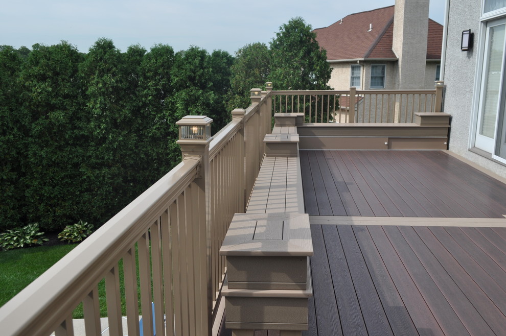 Deck - mid-sized transitional backyard deck idea with no cover