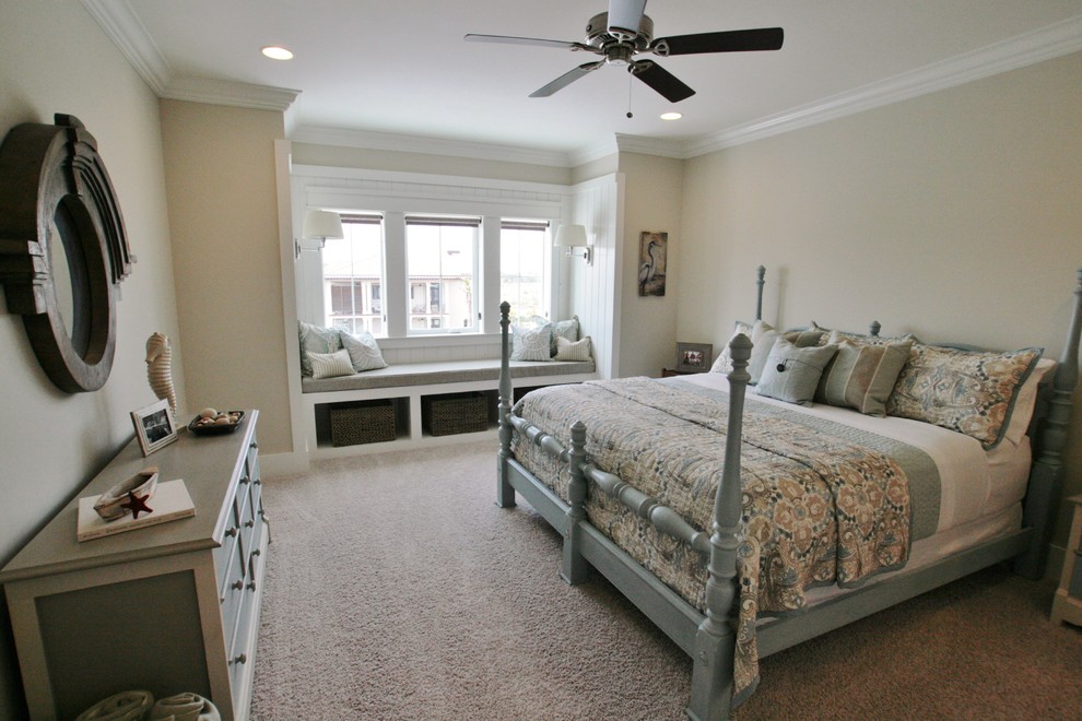 This is an example of a mid-sized beach style guest bedroom in Miami with grey walls and carpet.