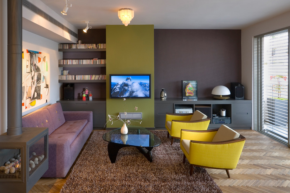 Contemporary living room in Other with grey walls and a wall-mounted tv.
