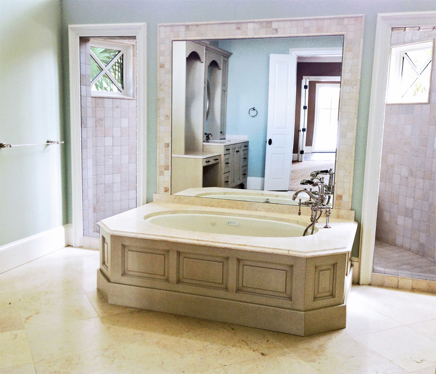 Photo of a mid-sized traditional master bathroom in Jacksonville with raised-panel cabinets, beige cabinets, an undermount tub, an open shower, a two-piece toilet, beige tile, ceramic tile, green walls, porcelain floors, an undermount sink, marble benchtops, beige floor and an open shower.