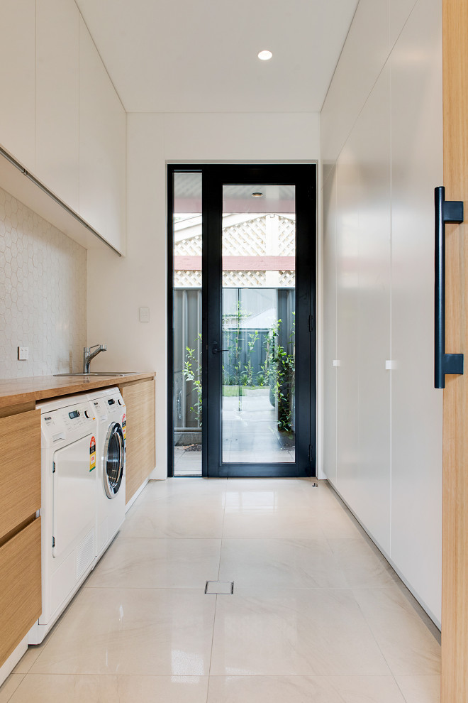 This is an example of a modern laundry room in Adelaide.