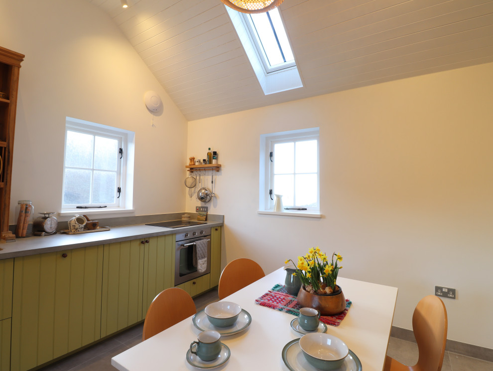 Inspiration for a large modern single-wall kitchen/diner with a single-bowl sink and concrete worktops.