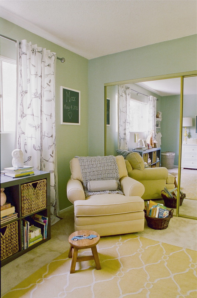 Design ideas for a mid-sized transitional gender-neutral kids' bedroom in Los Angeles with green walls and carpet.