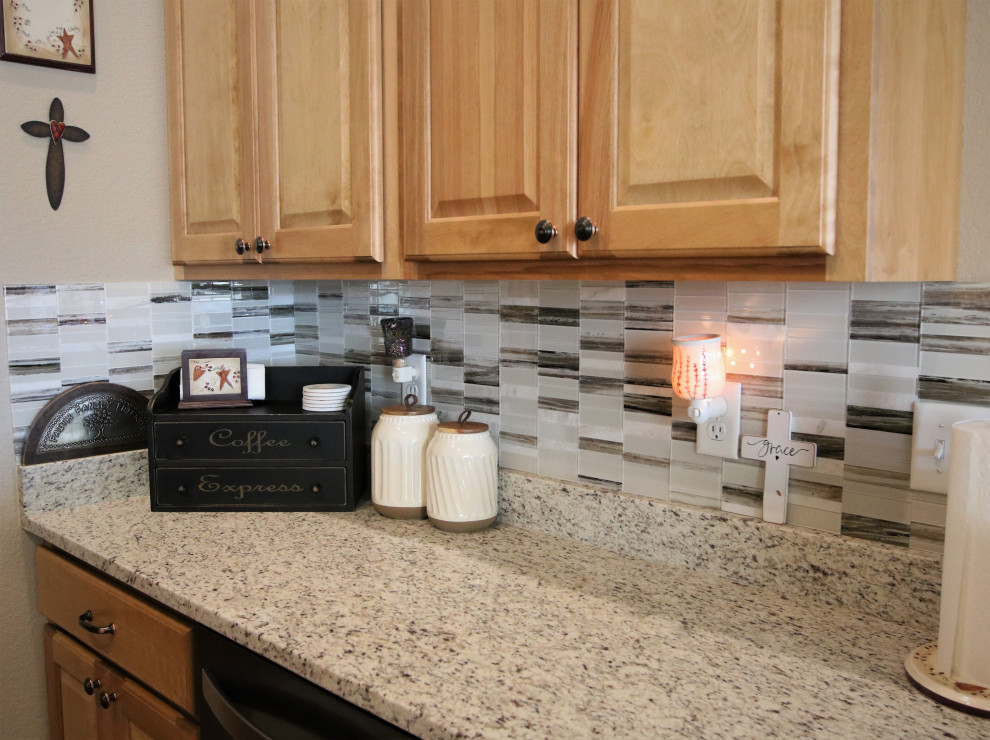 Eat-in kitchen - small eat-in kitchen idea with granite countertops, multicolored backsplash, mosaic tile backsplash and multicolored countertops