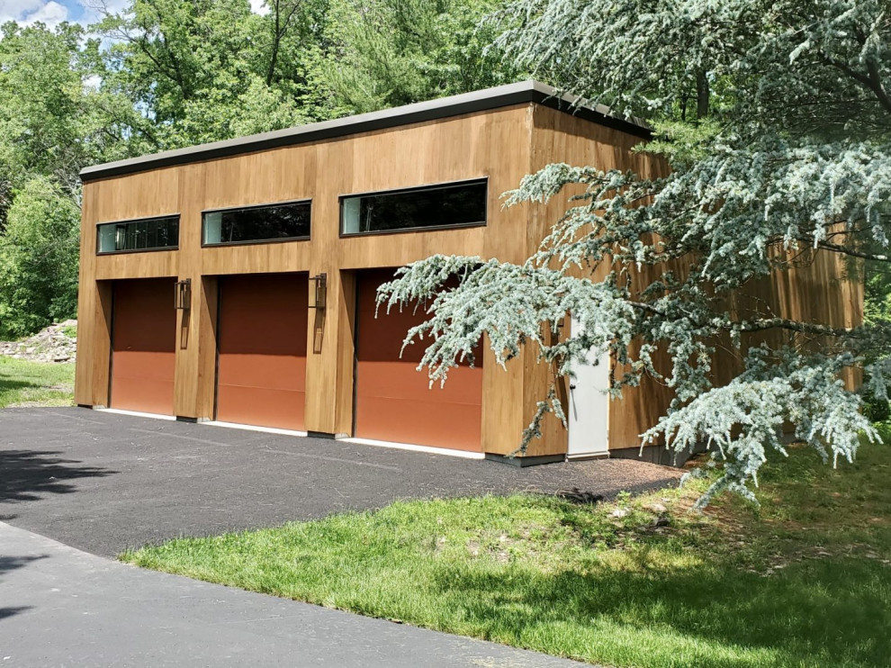 Photo of a modern detached three-car carport in Other.