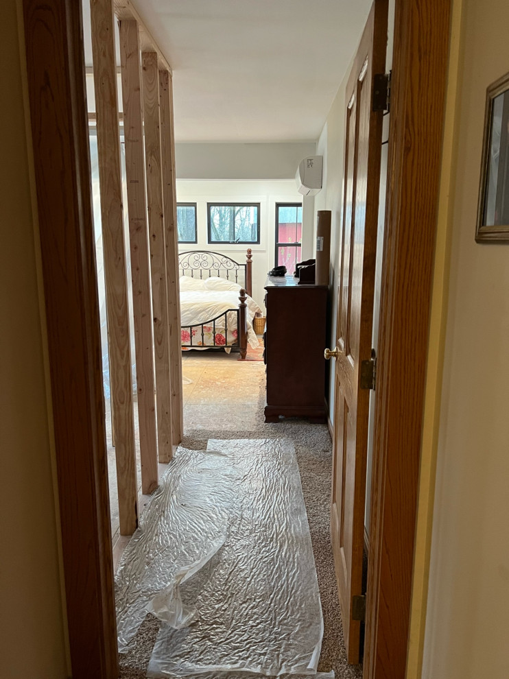 Should door open to bedroom or hallway?
