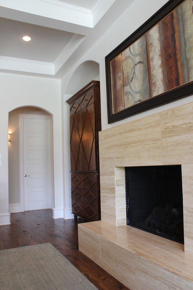 Inspiration for a mid-sized transitional formal open concept living room in Austin with white walls, a standard fireplace and a tile fireplace surround.