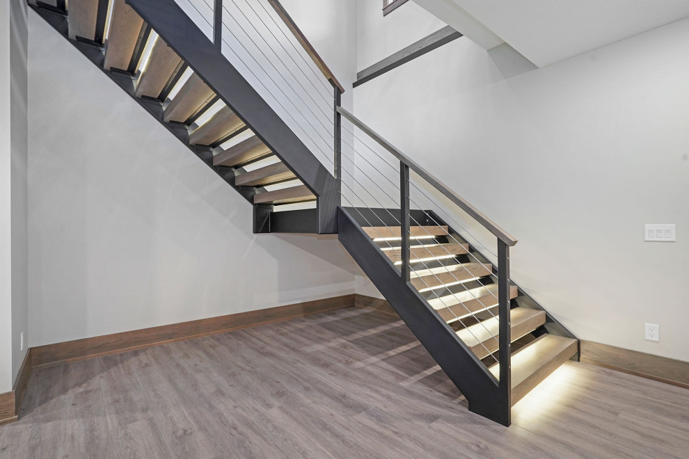 Mountain style staircase photo in Grand Rapids