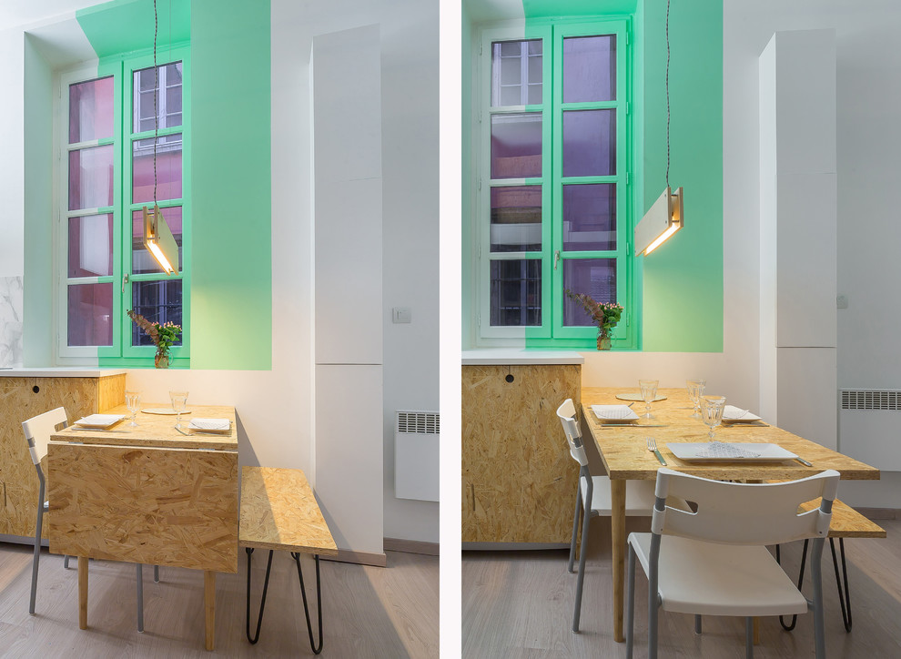 Inspiration for a small scandinavian kitchen/dining combo in Lyon with green walls.