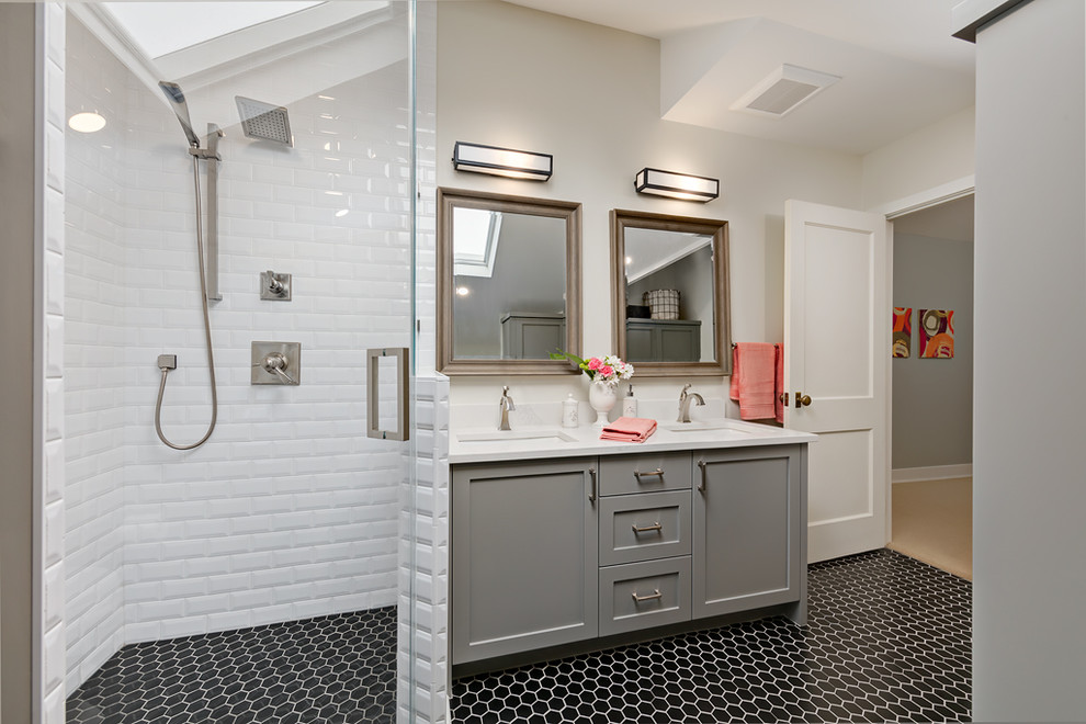 Mid-sized transitional kids bathroom in Calgary with grey cabinets, an alcove shower, black and white tile, ceramic tile, recessed-panel cabinets, white walls, ceramic floors, an undermount sink and quartzite benchtops.