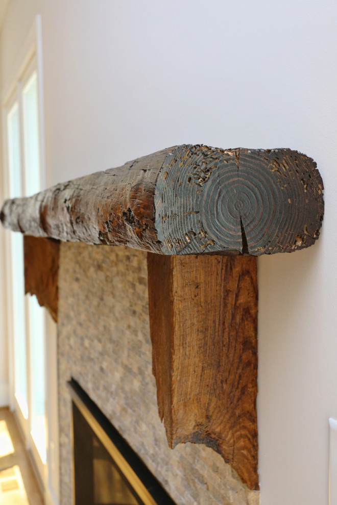 Example of a transitional home design design in Raleigh