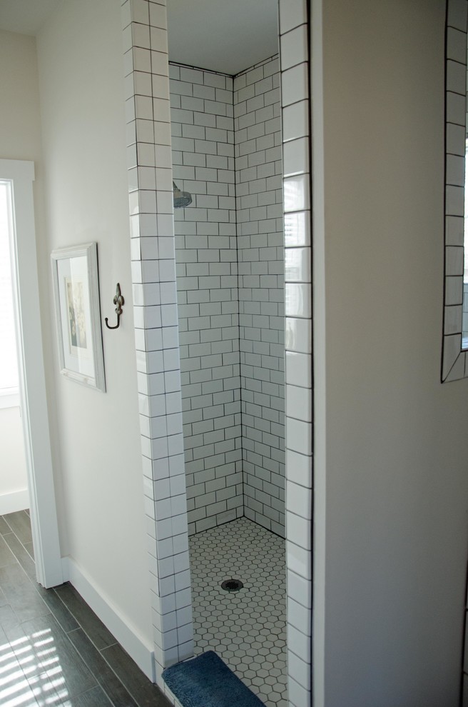 Photo of a large country master bathroom in DC Metro with shaker cabinets, white cabinets, solid surface benchtops, an open shower, white tile, ceramic tile and ceramic floors.