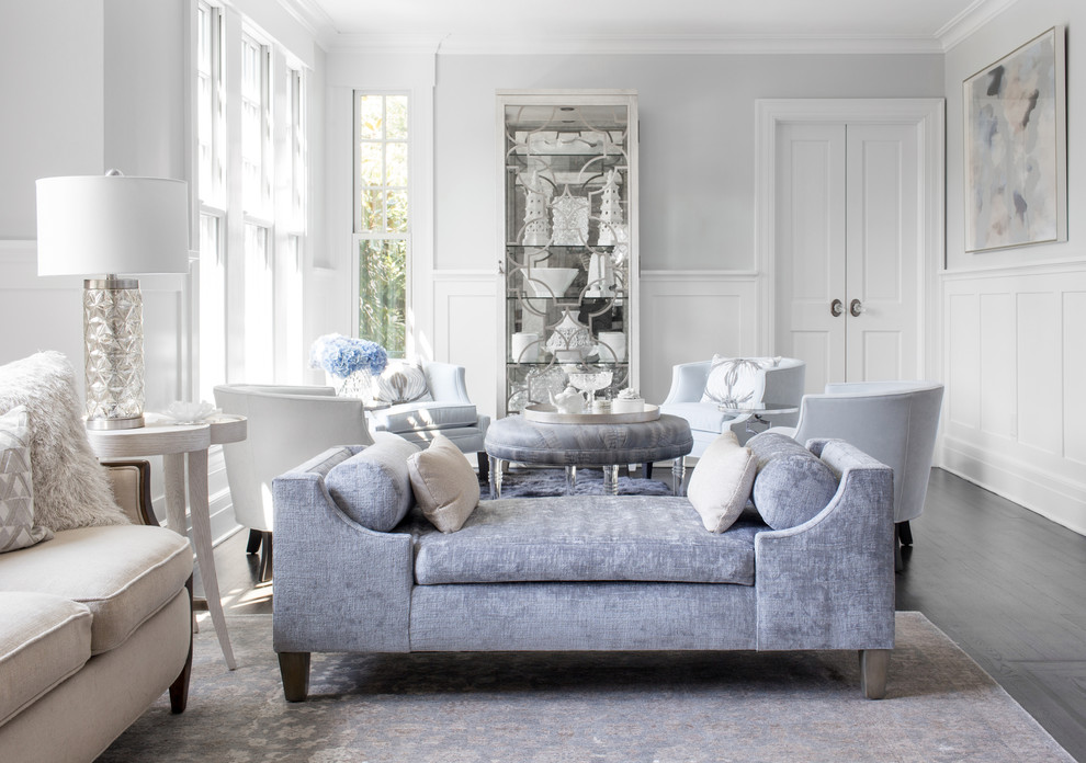 Living room - mid-sized coastal formal and enclosed medium tone wood floor and brown floor living room idea in New York with blue walls, a standard fireplace, a stone fireplace and no tv