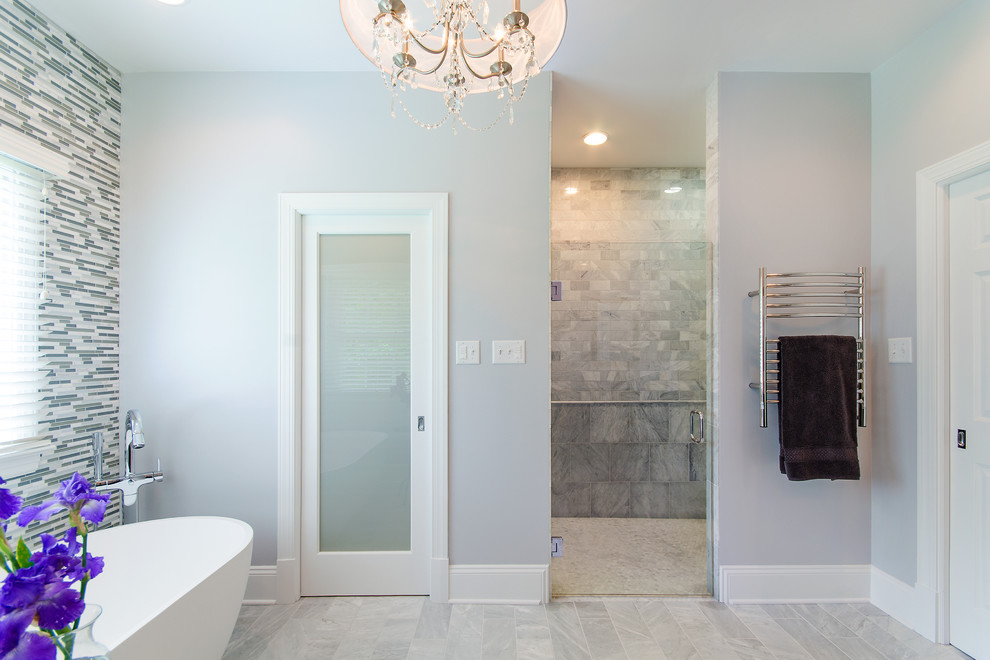 Design ideas for a large transitional master bathroom in Richmond with recessed-panel cabinets, dark wood cabinets, a freestanding tub, gray tile, white tile, matchstick tile, grey walls, porcelain floors and granite benchtops.