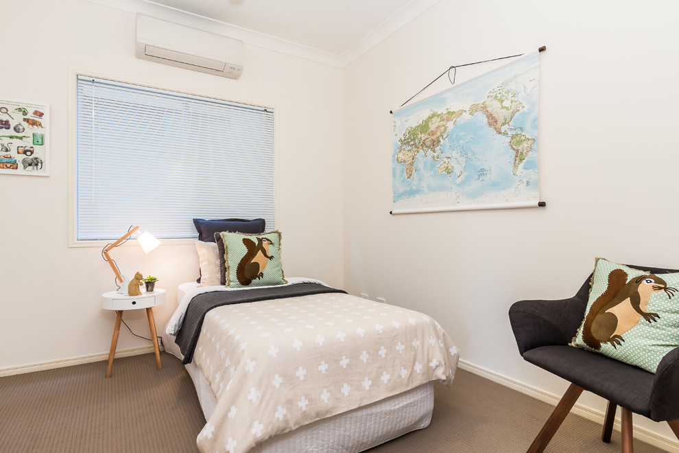 Scandinavian kids' room in Brisbane with white walls and carpet for girls.