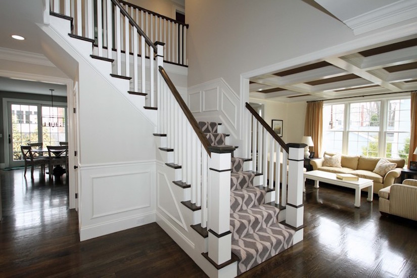Photo of a mid-sized arts and crafts wood curved staircase in Phoenix with painted wood risers.