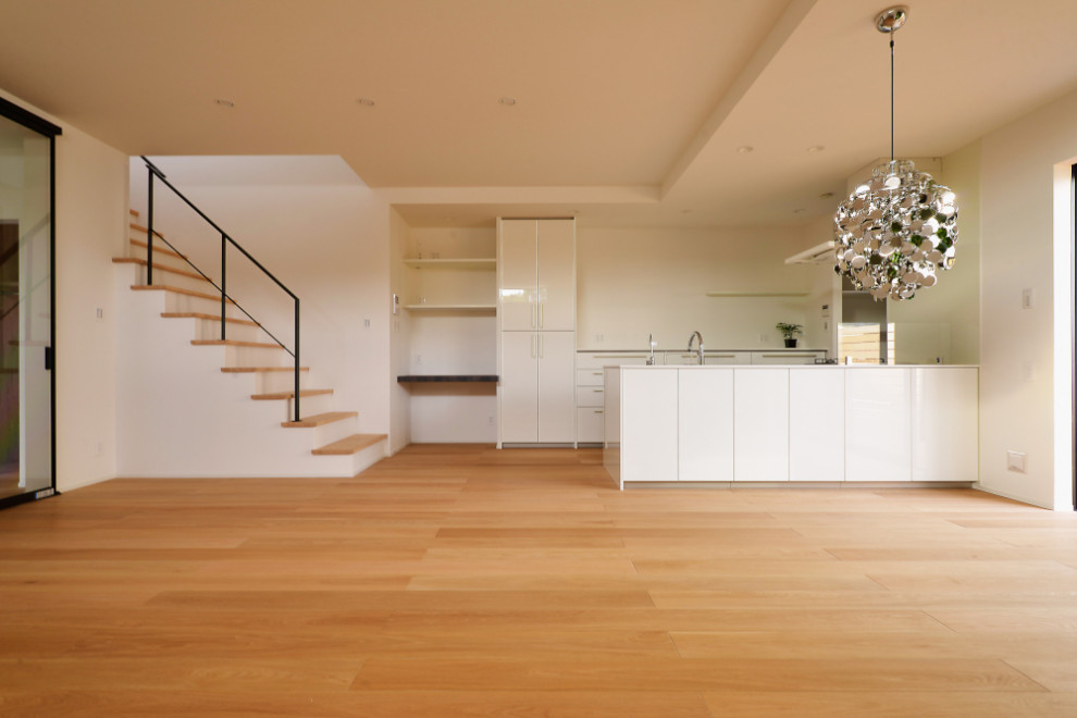 Inspiration for a modern open plan living room in Tokyo Suburbs with plywood flooring.