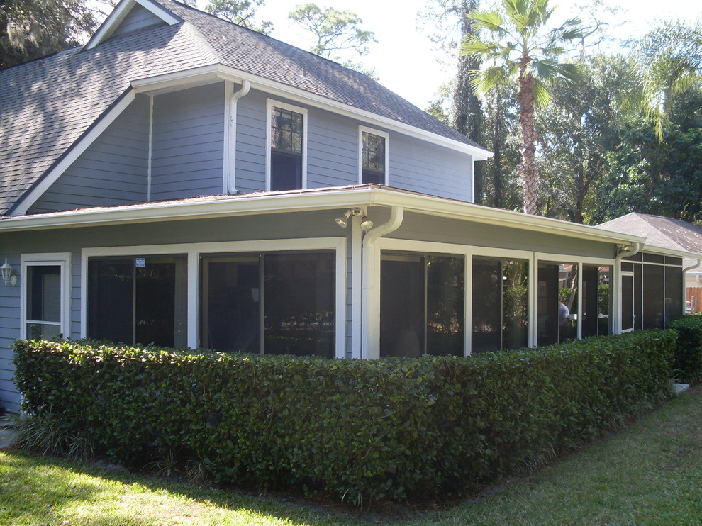This is an example of a traditional sunroom in Orlando.